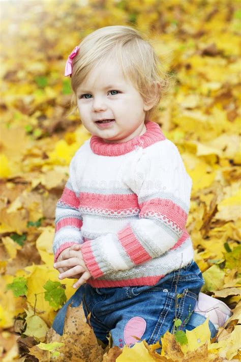 Baby Girl With Autumn Leaves Stock Photo Image Of October Person