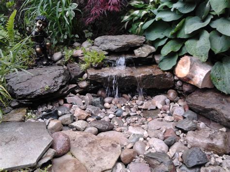 I'm looking at about 2 feet in height, running downwards about 3 to 3 1/2 feet long. Diy pondless waterfall | Yard | Pinterest