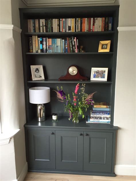 There was a chimney breast running through one of the walls which was just off. Handmade shelving, alcove unit, painted dark grey and ...
