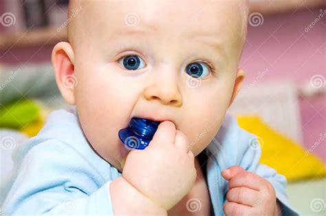 Baby And Pacifier Portrait Stock Image Image Of Colourful 8792199