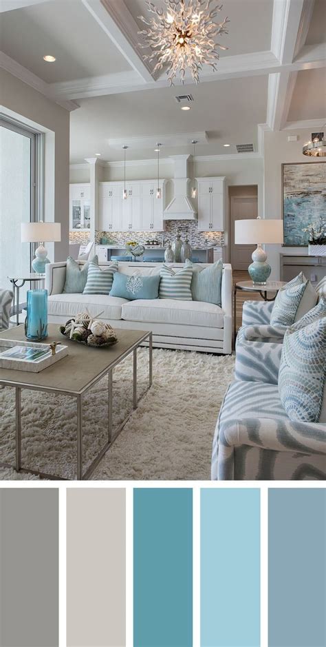 A Living Room Filled With Lots Of Furniture And Blue Accents In Shades