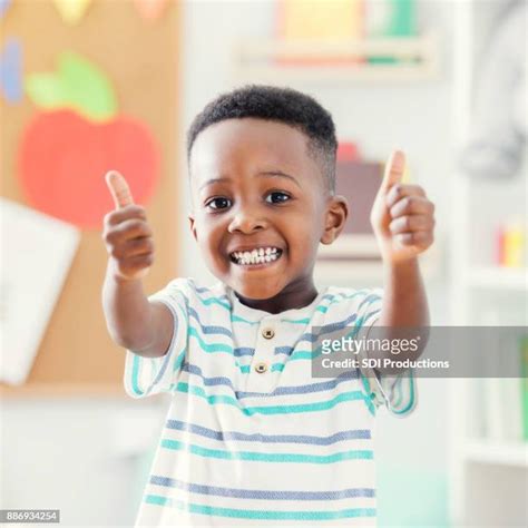 Black Boy Thumbs Up Photos And Premium High Res Pictures Getty Images