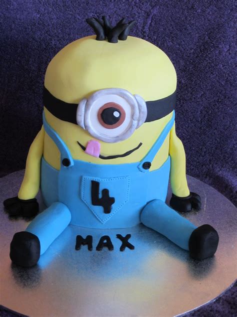 Cut the cake into 2 smaller rectangles, one slightly larger than the other. Minion Cake https://www.facebook.com/pages/Cupcakes-by-Renee/207589839368972 | Minion cake ...