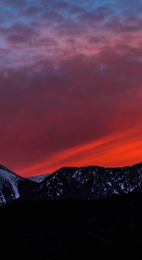 Download Wallpaper 1440x2630 Mountains Sunset Sky Snow Mountains