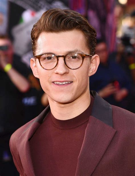 First look at tom holland as tom holland's performance in the devil all the time lauded by fans. Tom Holland Attends the Spider-Man Far From Home Premiere ...