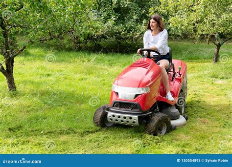 Woman In Field Garden Job Driving A Lawn Mower Stock Image Image Of