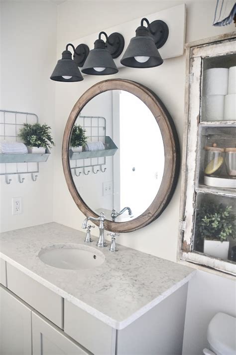 Bathroom vanity ideas, all different types: DIY Farmhouse Bathroom Vanity Light Fixture - Liz Marie Blog