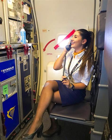 flight attendant talking on the phone