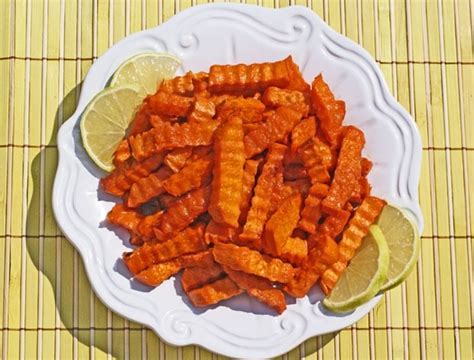 While oil heats, cut potatoes. Sweet Potato Margarita Fries #alexiafoods