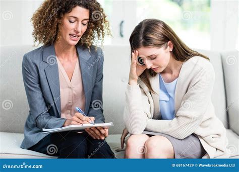 Psychologist Counselling Upset Woman At Home Stock Image Image Of