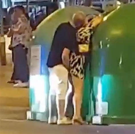 Couple Perform Sex Act Against A Bin In The Presence Of Shocked