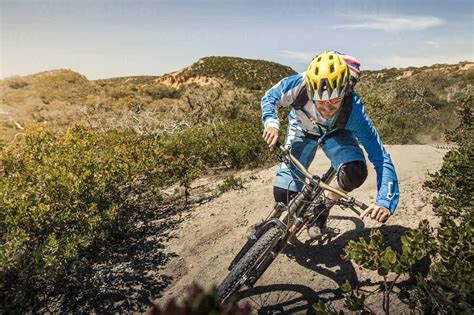 Man Riding Mountainbike On Dusty Trail Fort Ord National Monument Park