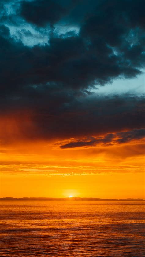 Download Wallpaper 938x1668 Sea Horizon Sunset Clouds Sun Sky