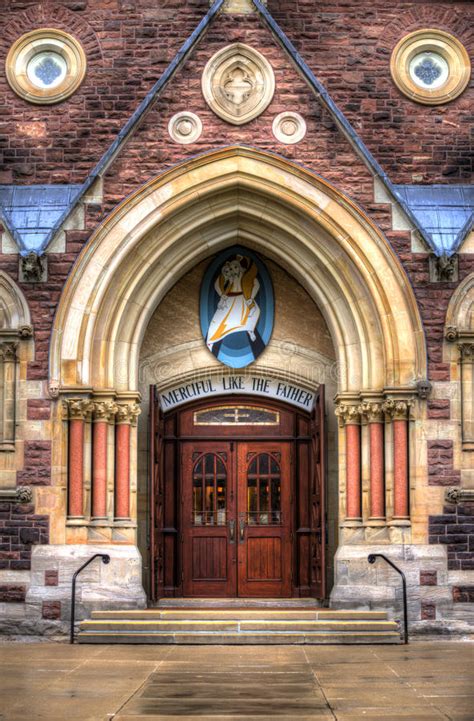They also symbolize hands clasped in prayer. Entrance Roman Catholic Church (Cathedral) Stock Photo ...