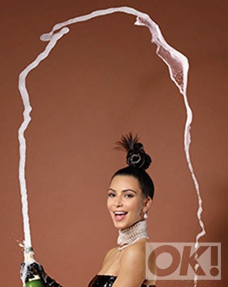 Do Not Try This At Home Kim Kardashian Balances A Champagne Glass On Her