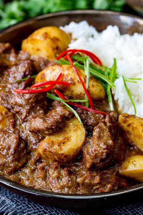 So, let's take a look. Slow Cooked Beef Massaman Curry - Rich, fall-apart beef in a spicy homemade sauce with new ...