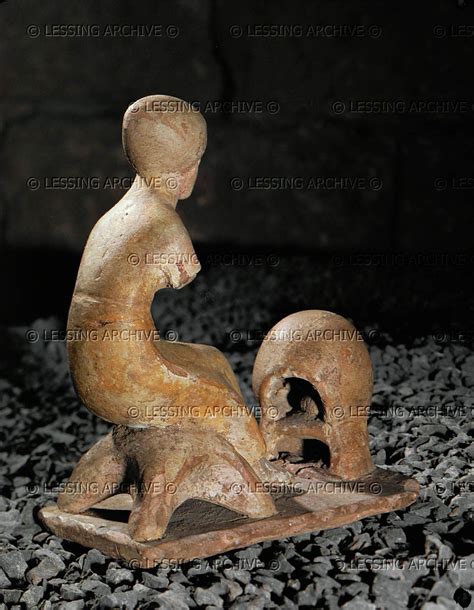 Hellenistic Figurine Th Bce Woman Kneeling In Front Of An Oven Terracotta Early Th Bce From