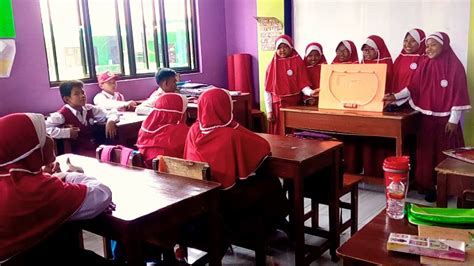 Praktek IPA kelas 6A materi "Rangkaian listrik seri " MI ASSUYUTIAH