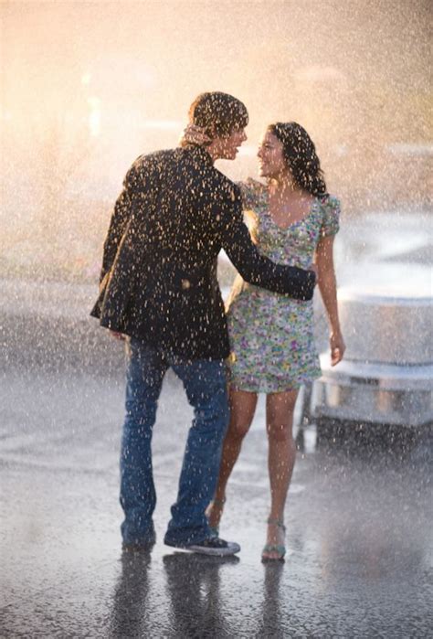 Romantic Couple Kissing Rain