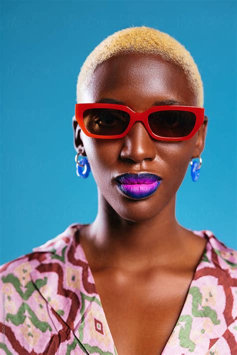 Trendy Black Woman In Vintage Sunglasses By Stocksy Contributor