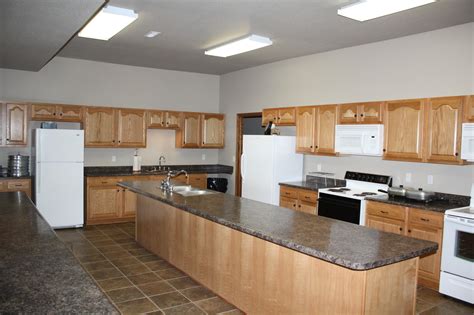 It features two adjoining walls that hold all the countertops, cabinets, and kitchen services, with the other two adjoining walls open. Church kitchen design layout - Apartment design ideas for ...