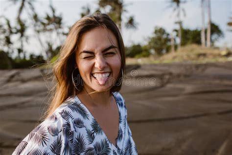 Attractive Girl Sticking Tongue Out On Beach Stock Image Image Of Coastline Indonesia 129156353