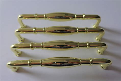 Modern drawer pulls, suitable for kitchen cabinet, cupboard, dresser drawers, closet, wordrobe, wooden furniture and so on. Modern Gold Pulls, 5 in centers, 4 Sleek Brass Cabinet ...