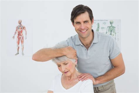 Senior Woman Getting The Neck Adjustment Done Stock Image Image Of