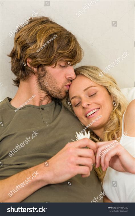 Cute Couple Cuddling On Their Bed Stock Photo 606964220 Shutterstock