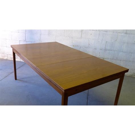 Wooden construction makes it sturdy, so it's going to last you a long time. Extra Long Mid Century Modern Swedish Dining Table by Skaraborgs | Chairish