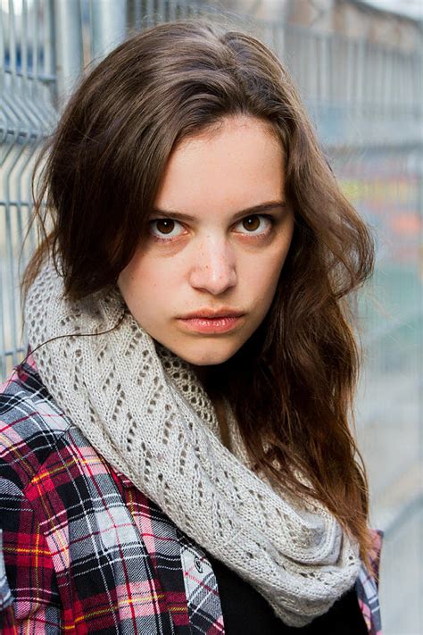 Portrait Close Up Of Young Beautiful Woman With Aggressive Look