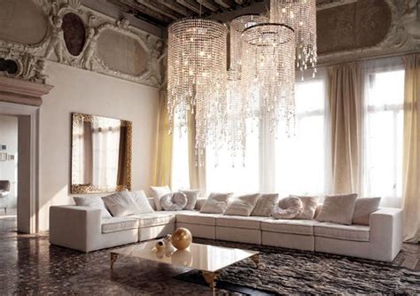 The chandelier adds great light and interest to the ceiling. A large chandelier in the living room wallpapers and ...