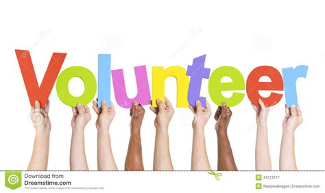 Diverse Hands Holding The Word Volunteer Stock Photo - Image: 41013777
