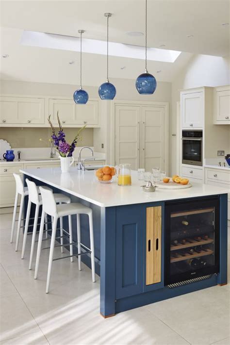 A kitchen island has no set structure, it is made just the way you design it and the possibilities are endless! Blue round glass pendant lights by Curiousa & Curiousa ...