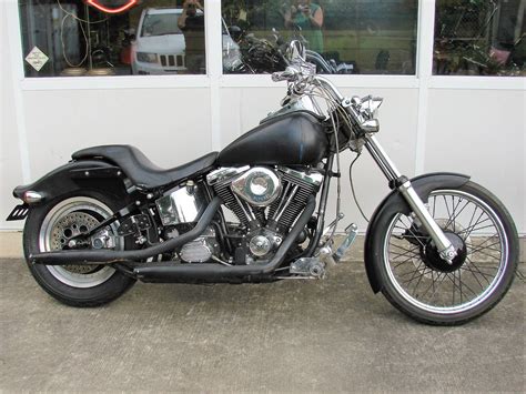 This bike is finished in deep blue with pin stripping and screaming eagle tank logos. 1998 Harley-Davidson® FXSTC Softail® Custom (Matte Black ...