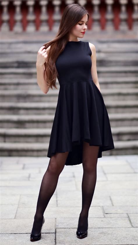 black dress with long back black stockings and patent leather heels fashion tights