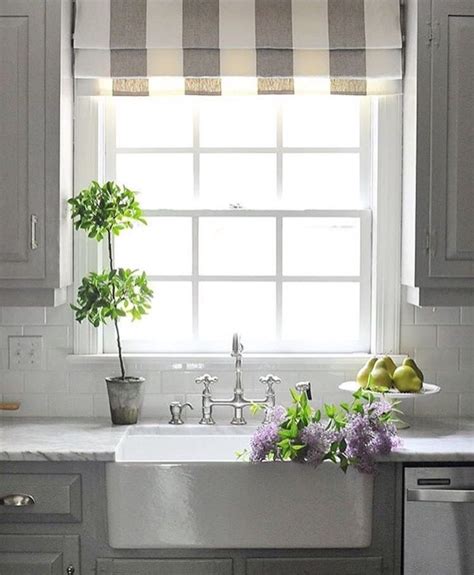A Roman Shade Over A Kitchen Sink Window Offers A Great Touch Of