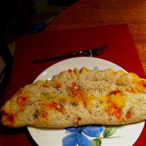 Knead on speed 2 for 2 minutes. http://www.food.com/recipe/kitchenaid-crusty-pizza-dough ...