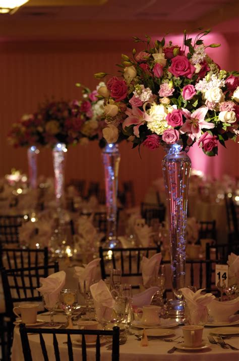 As soon as you look at these three photos, you figured out how to do that, right? Pink_Tall_Centerpiece: Tall Centerpieces: Reception: My Wedding Blooms