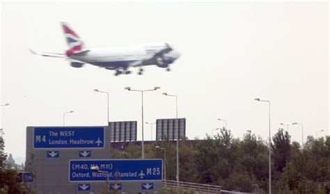 A British Airways Plane Flight Landing At London Heathrow Airport