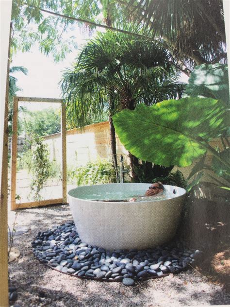 Having already turned a 1,000 gallon stock tank into a koi pond in his east austin backyard, he said one hot day he was eyeing a smaller tank he'd picked up at callahan's. Outdoor tub | Large backyard landscaping, Outdoor tub ...