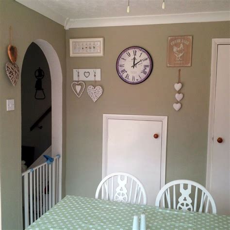 Olive green paint is having a moment, and it's not hard to see why. Dulux Overtly Olive | Conservatory dining room, Living ...
