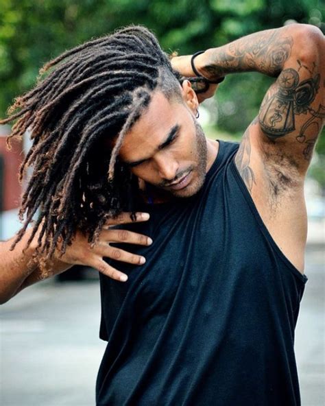 Whether you have long curly hair that goes past your shoulders, or long hair that just meets the shoulders, you can pull it up in a man bun, give it highlights, pull together a couple of braids, do a half updo, or a plethora of other hairstyles with. 40 Fashionably Correct Long Hairstyles for Black Men ...