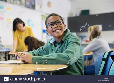 Smiling Elementary Student In Classroom Stock Photo Alamy