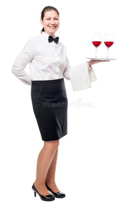 Portrait Of A Young Waitress With Glasses Of Red Wine On A Tray Stock