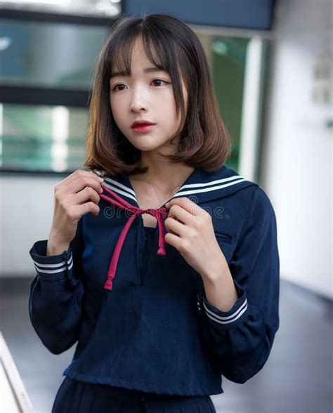 Asian Girl Student In School Uniform Learning In The Classroom Stock