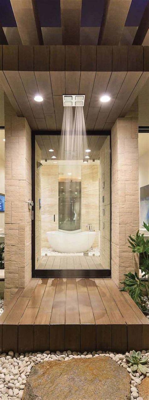A shared palette of neutral colors and materials furthers the connection between the shower and tub. 25+ Must See Rain Shower Ideas for Your Dream Bathroom ...