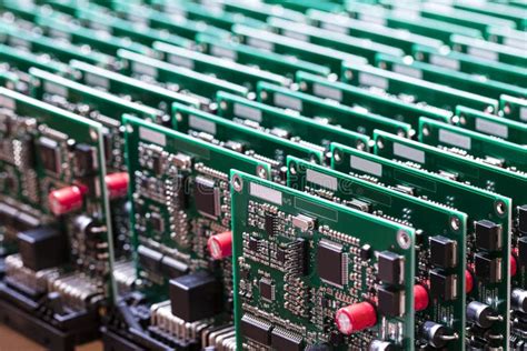 Closeup Of Line Of Ready Automotive Printed Circuit Boards With Surface