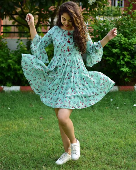 4.7 out of 5 stars with 19 ratings. Aqua green floral print summer dress by Label Shivani Vyas ...