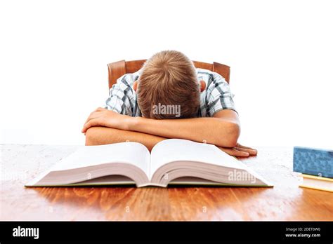 Teen Guy Fell Asleep Sitting With Books Student Sleeping At Desk In
